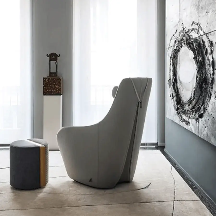 Exceptional Giorgetti Tie XL lounge chair upholstered in matte gray textile with a solid ash wood base and distinctive vertical zipper detail