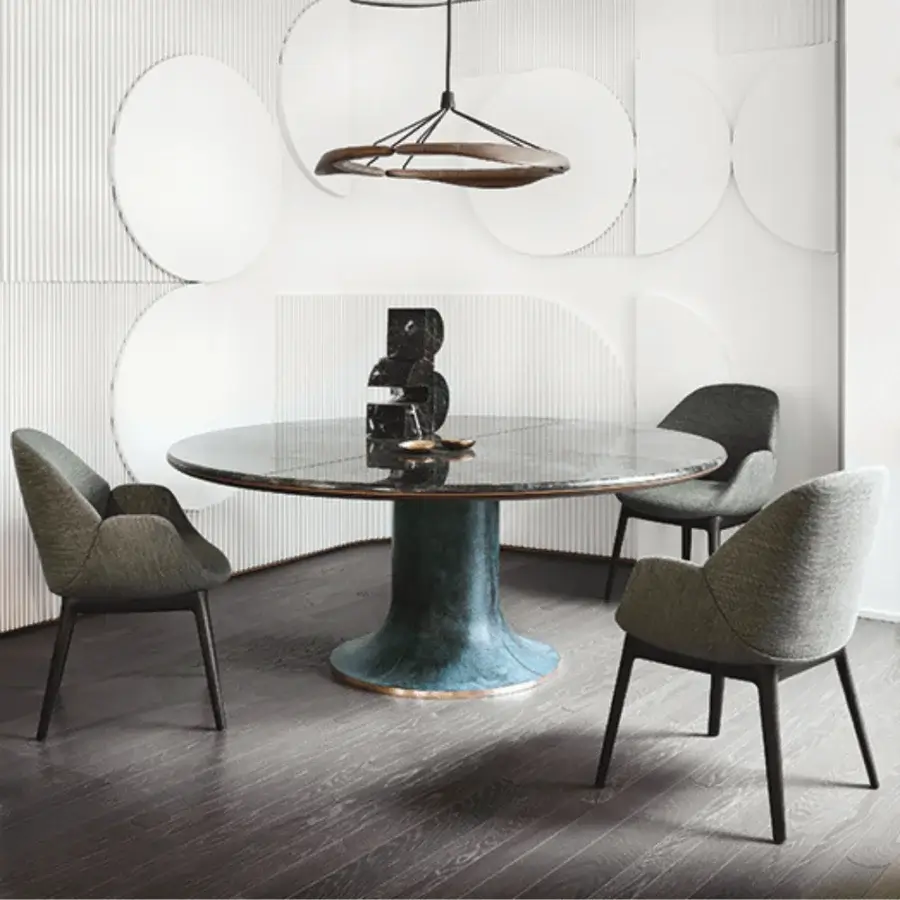 Distinguished Giorgetti Calathea armchair with curved silhouette and dark-toned wooden legs built with uniform gray fabric upholstery