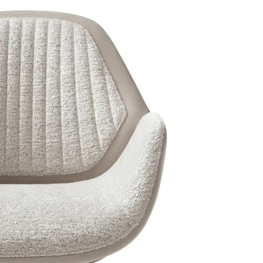 Exceptional Giorgetti Calathea guest armchair crafted in Italy with neutral textile upholstery and leather accents