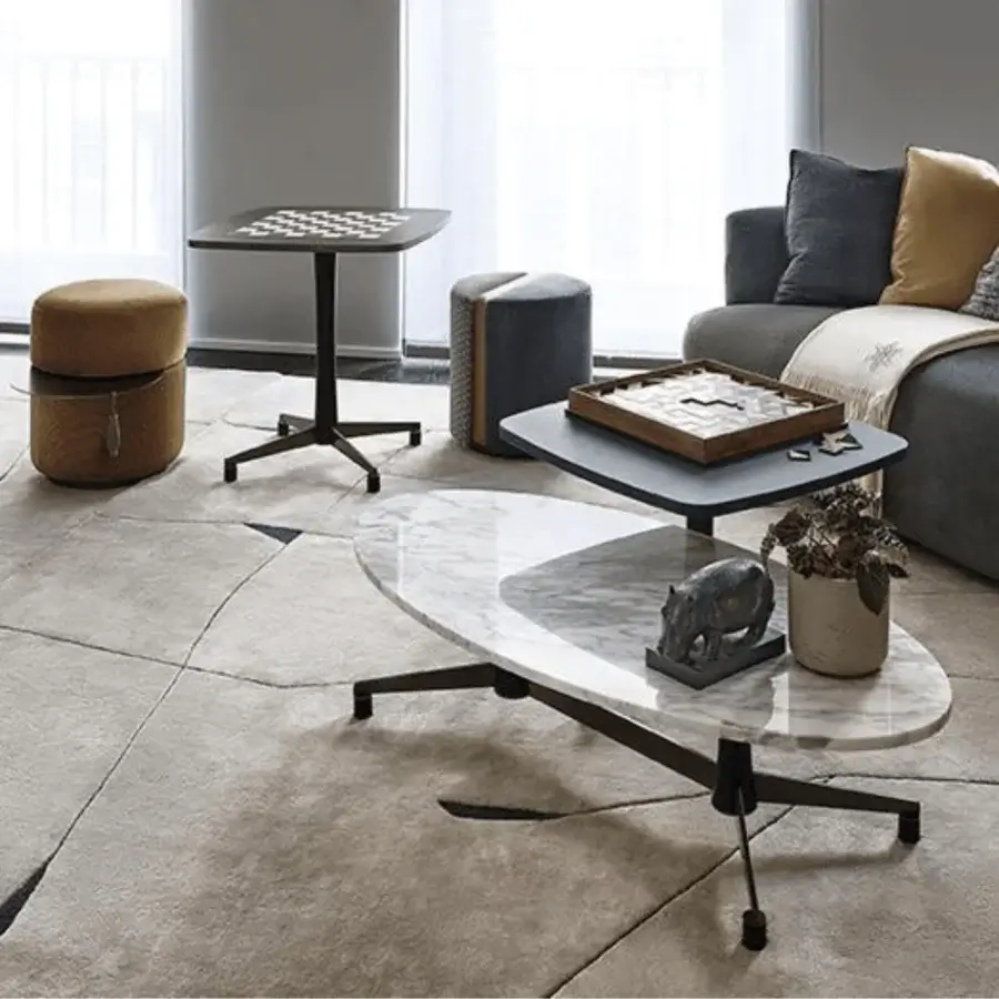 Exceptional Giorgetti Spark coffee table with a polished white and grey marble top built with sleek dark metal legs