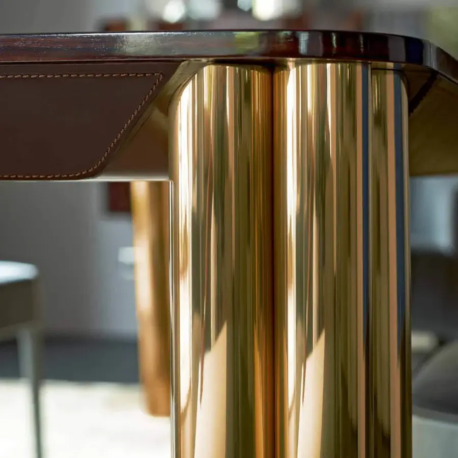 Lavish Rugiano Forest table crafted with supple brown leather and gold finished tubular legs