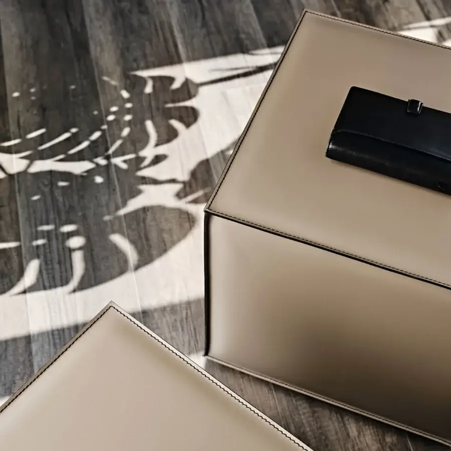 Superior Cattelan Italia Kubo ottoman upholstered in muted beige leather with contrasting stitching and wheeled base