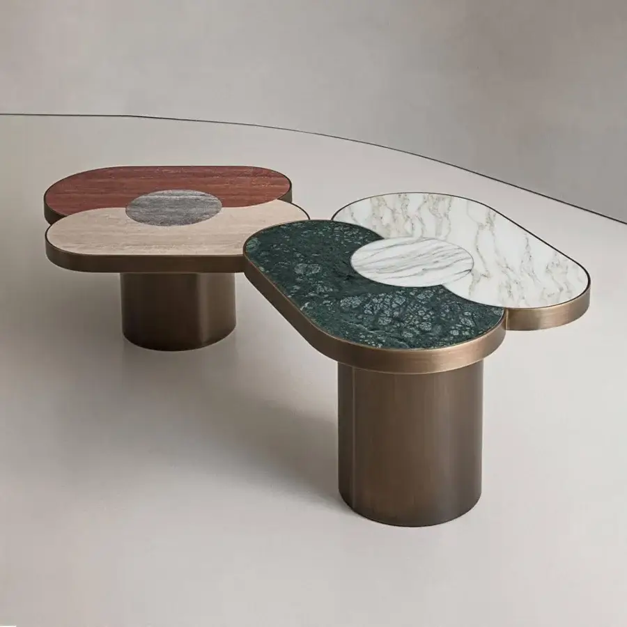 Distinguished Rugiano Landmark coffee table with Travertino silver, romano, and rosso marble sections built with bronzed brass metal