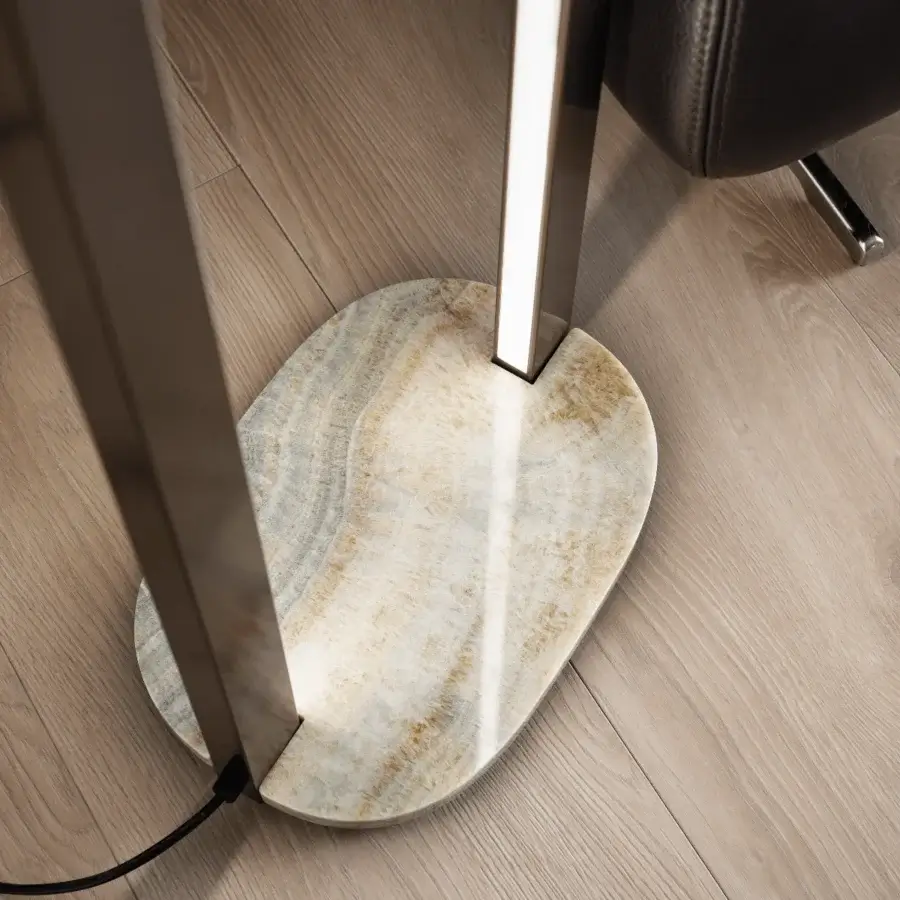 Distinguished Masiero Ebe floor lamp with metal structure and oval onyx stone base in swirling cream, beige, and gray patterns
