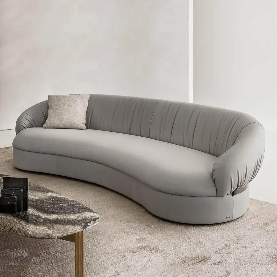 Exceptional Rugiano Fandango sofa with rounded shapes upholstered in muted gray textile and smooth finish