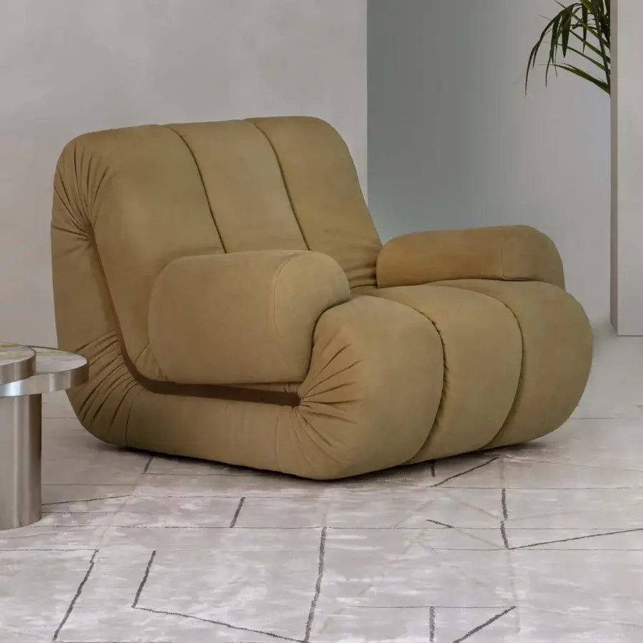 Distinguished Rugiano Snake lounge chair with plush, segmented design upholstered in light brown textile and floor-supported structure