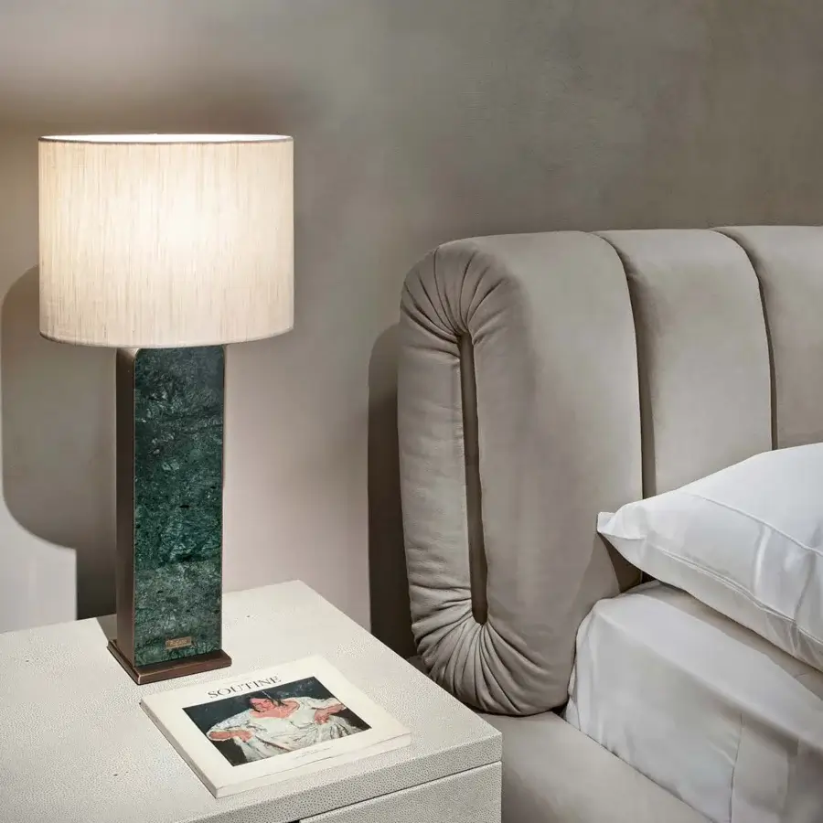 Distinguished Rugiano Snake bed with smooth muted grey textile upholstery and distinctive curved vertical panel detailing crafted in Italy