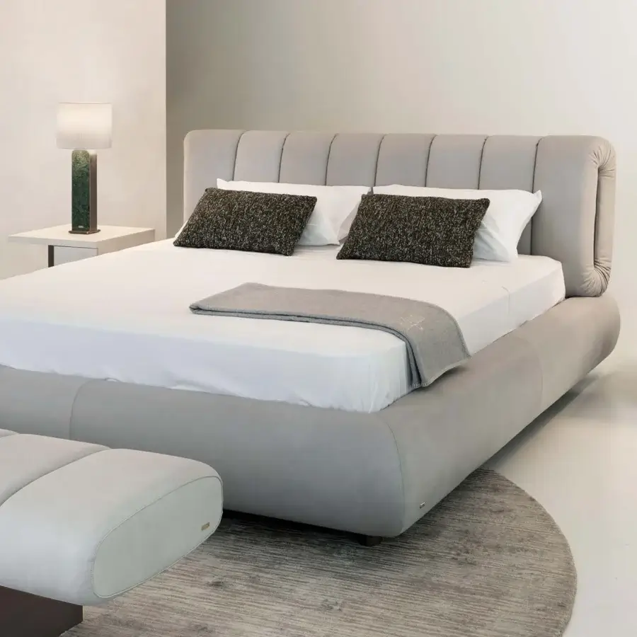 Exceptional Rugiano Snake bed with light gray textile upholstery and low-profile curved silhouette crafted in Italy