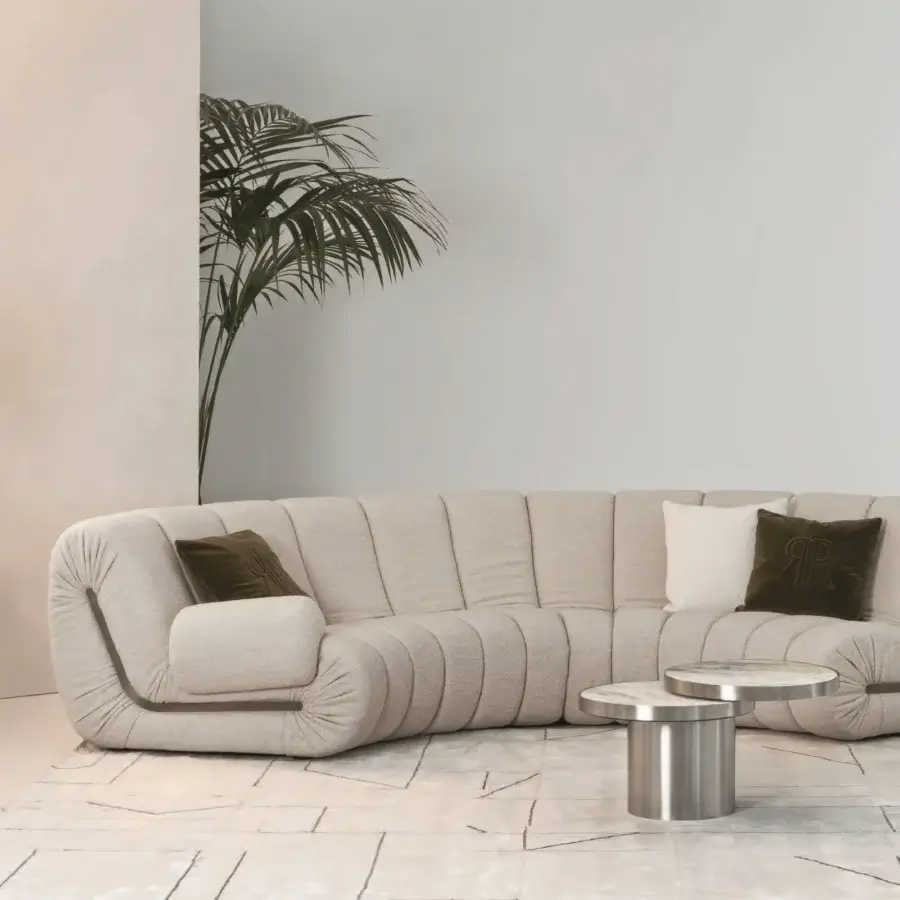 Elegant Rugiano Snake sectional upholstered in light beige textile with matte finish and channel-tufted detailing
