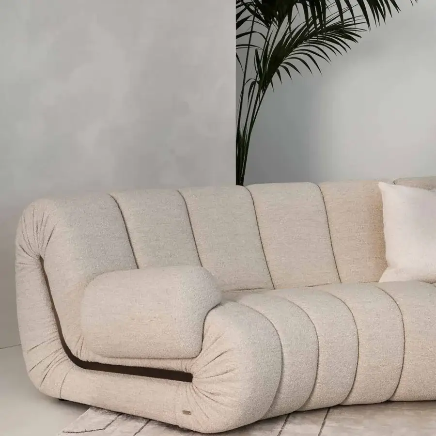 Distinguished Rugiano Snake sectional upholstered in creamy beige textile with textured matte finish