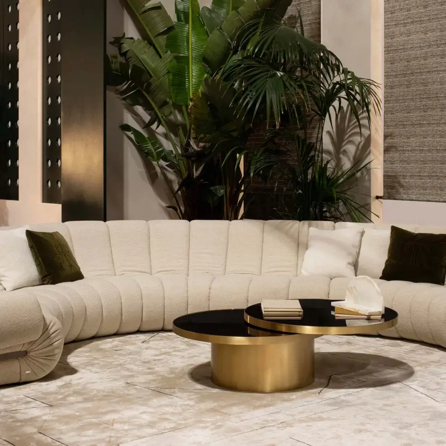 Distinguished Rugiano Snake sectional upholstered in light beige textured textile with horizontal channel tufting