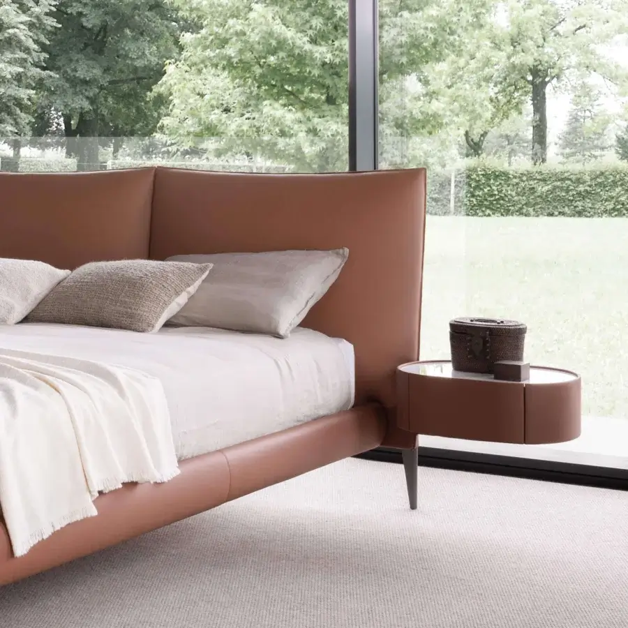 Distinguished Presotto Siena bed with upholstered headboard and frame in smooth light brown leather with Metal Standard Pewter feet