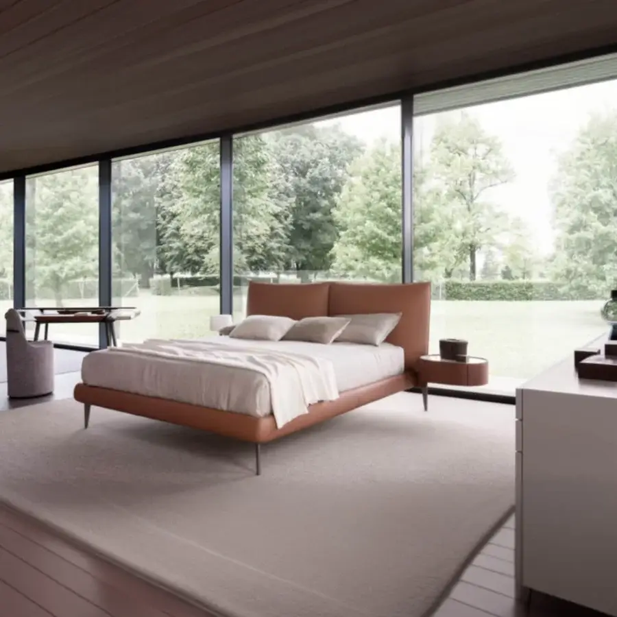 Exceptional Presotto Siena bed with light brown upholstered frame, padded headboard cushions, and pewter finished slanted metal feet