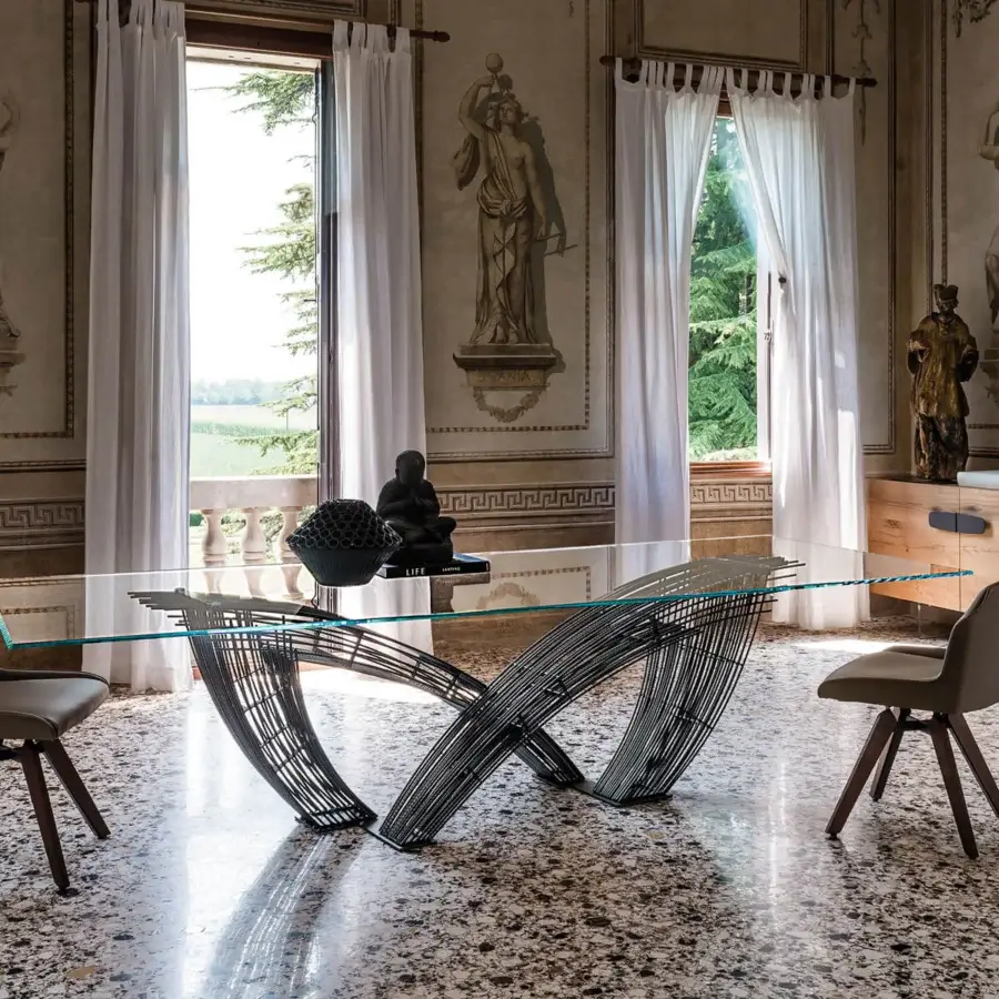 Exceptional Cattelan Italia Hystrix table crafted with a sculptural metal base and clear glass top in a dark gray matte finish