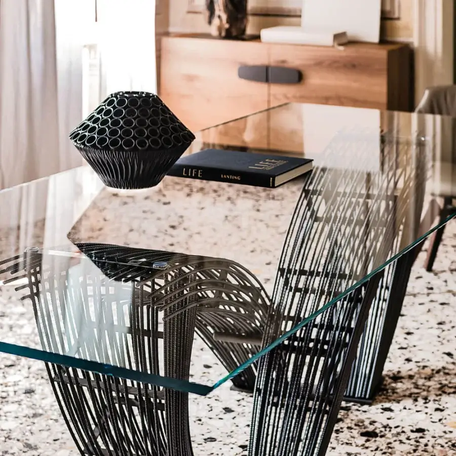 Harmonious Cattelan Italia Hystrix table built with a visually light metal base and rectangular glass top in a dark matte finish