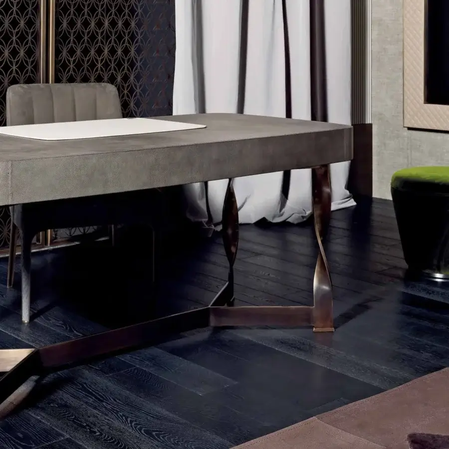 Sophisticated Rugiano Pliet desk with gray Italian leather upholstery and bronzed brass finished spiral steel legs