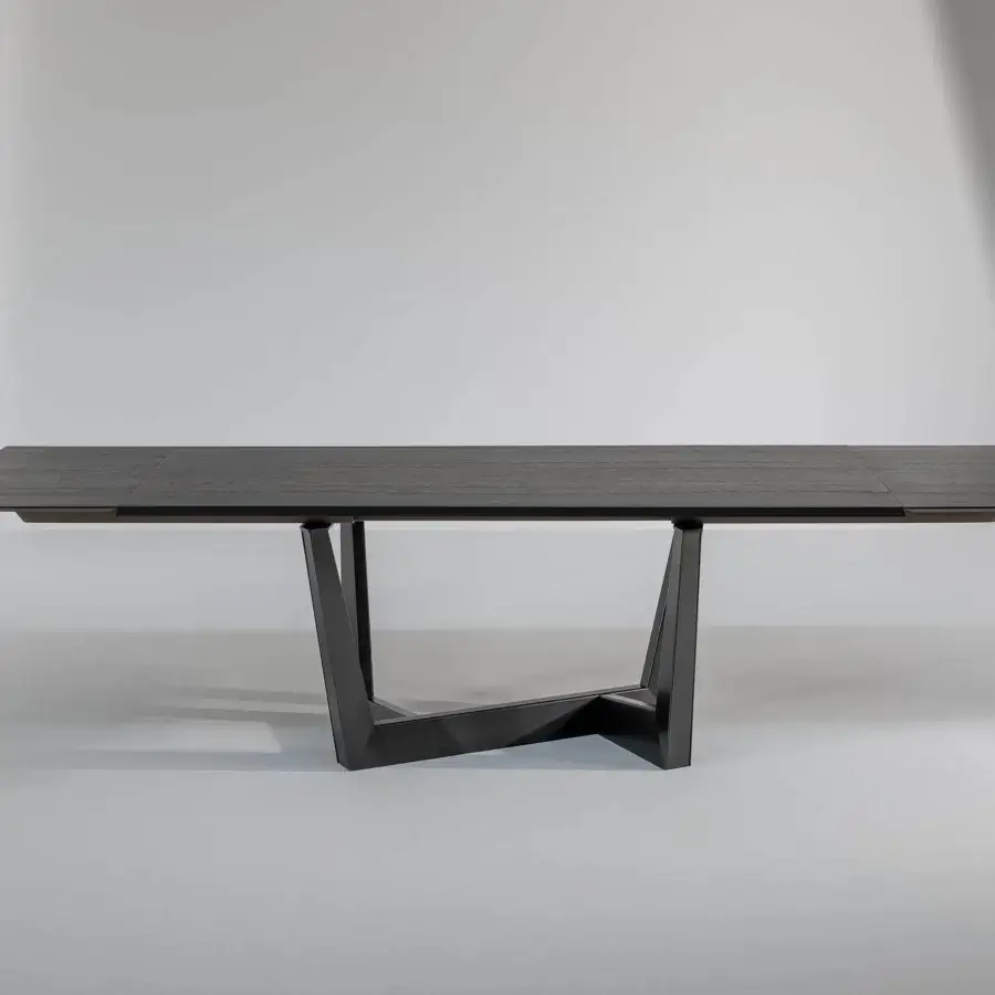Distinguished Bonaldo Art table with veneered wood top and dark metal trapezium base in matte finish
