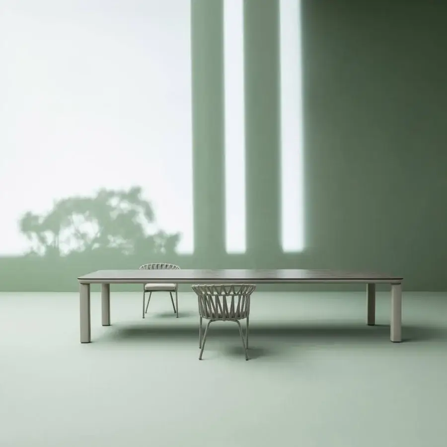 Distinguished Varaschin Customade table crafted with aluminum structure and sophisticated HPL top in a light grey matte finish