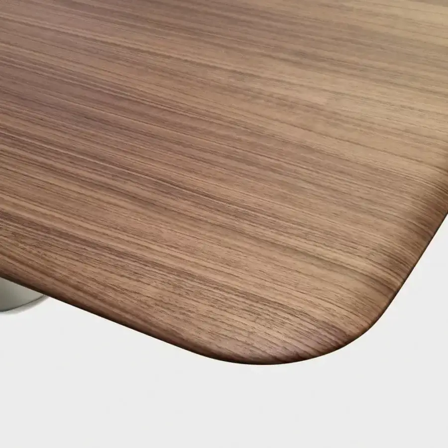 Harmonious Presotto Victor table with a medium brown wood-like surface and light gray double base crafted in Italy