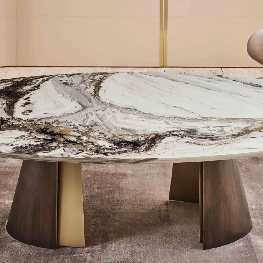 Lavish Rugiano Absolute table with oval marble top displaying black, white, gray and gold tones with smooth finish and dark wood legs