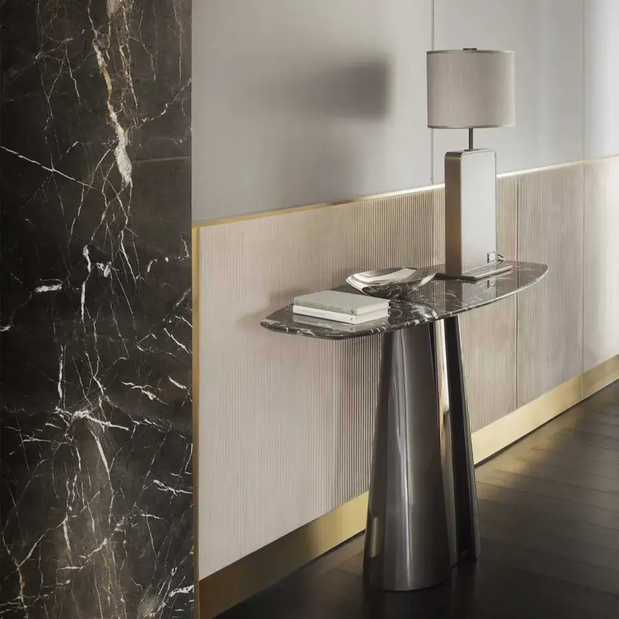 Distinguished Rugiano Absolute console with dark marble top exhibiting white and gold veining in glossy steel finish