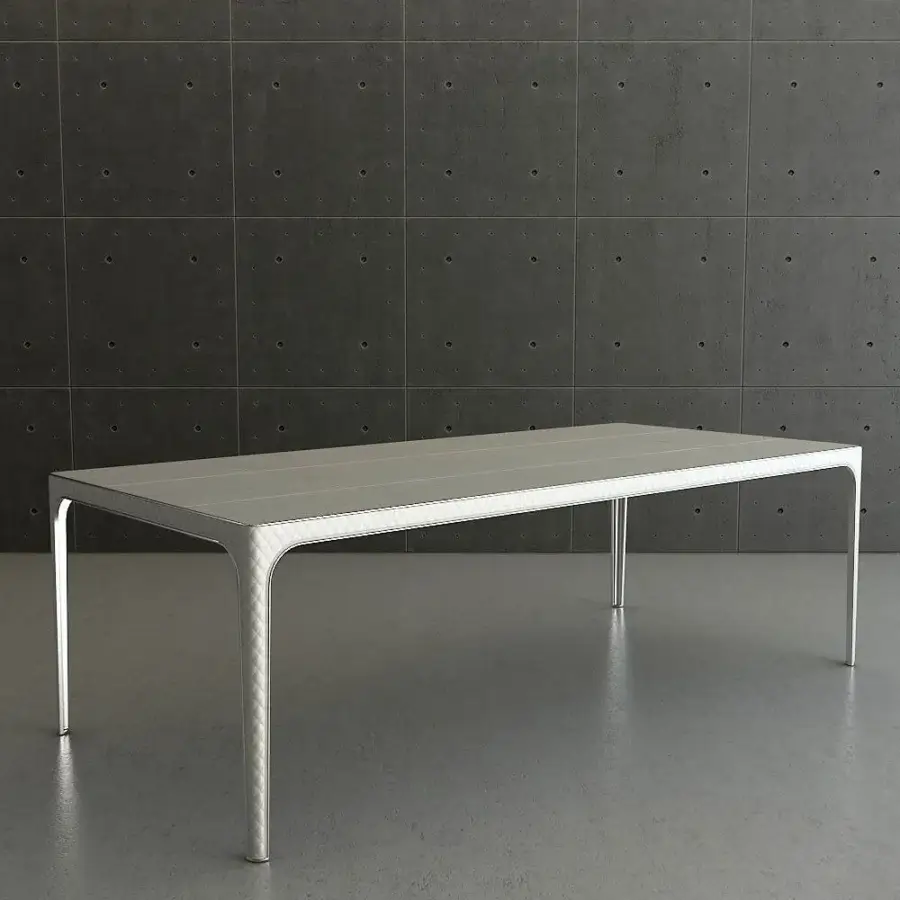 Distinguished Rugiano Alexander table with light gray glossy metal exhibiting sleek lines and seamless leg integration