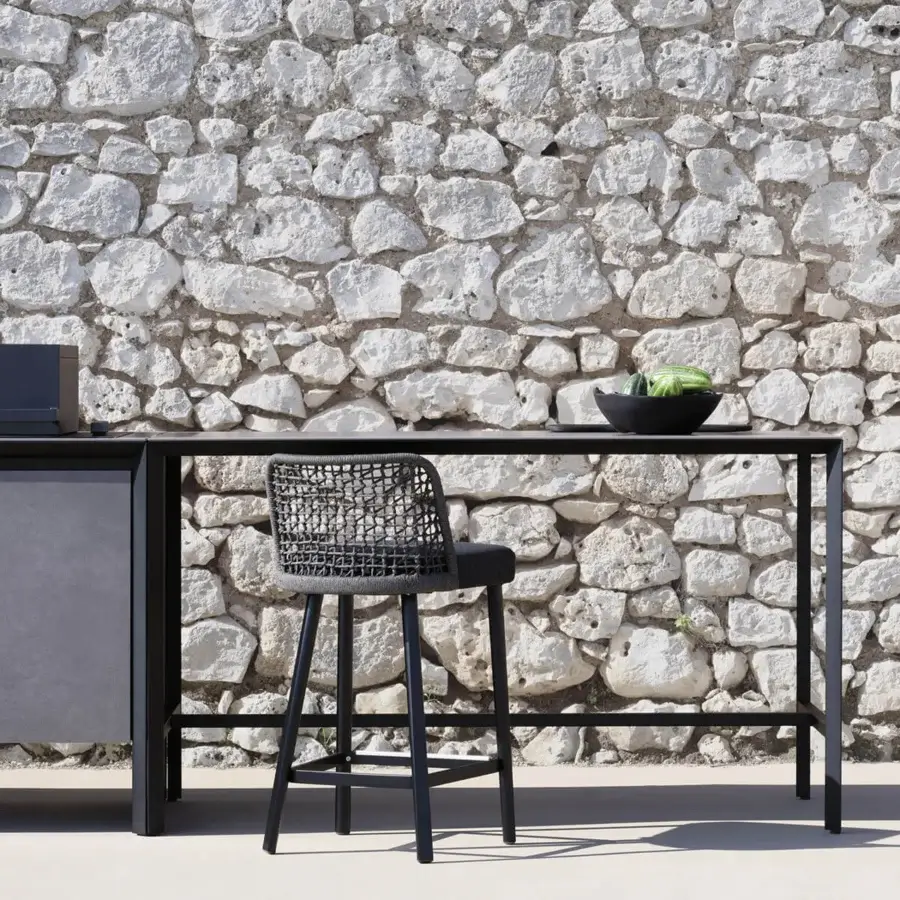 Sophisticated Varaschin Outdoor Cooking table with a sleek black aluminum frame and dark ceramic top