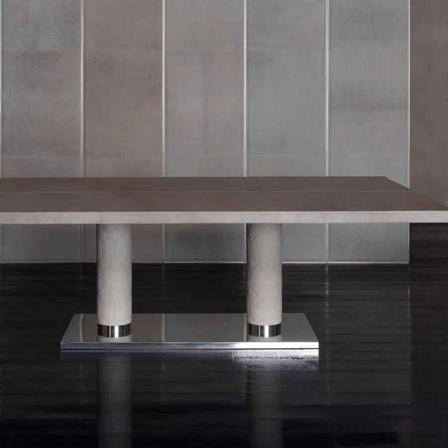 Elegant Rugiano Fujico table with light gray square panels, cream quilted leather columns and reflective Chrome platform