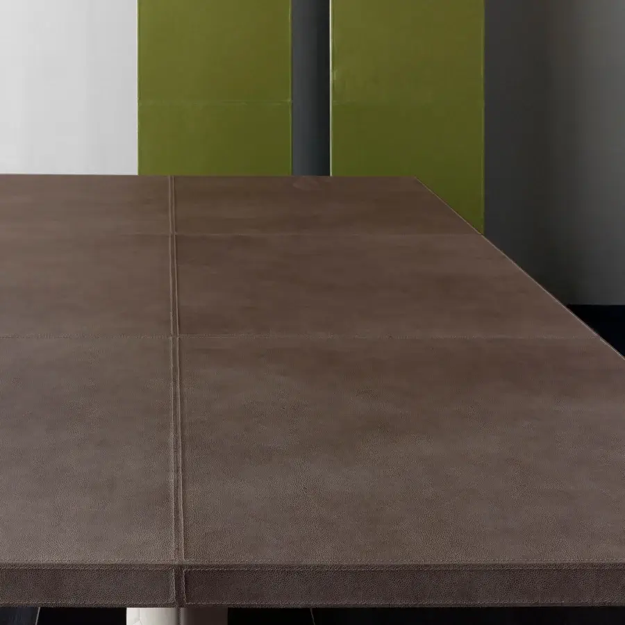Distinguished Rugiano Fujico table with brown leather tabletop and bronzed brass base crafted with a matte finish