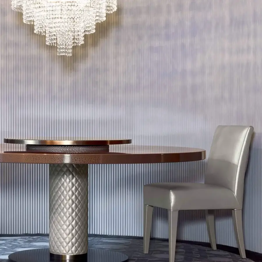 Distinguished Rugiano Fujico table with decoro painted wood and a sleek chrome base crafted with embroidered leather legs