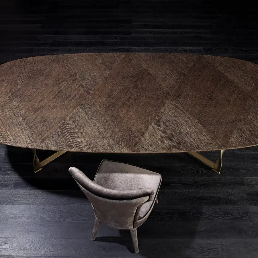Exceptional Rugiano Pliet table with bronzed brass base and chevron patterned wood tabletop in warm medium-brown tones with a matte finish