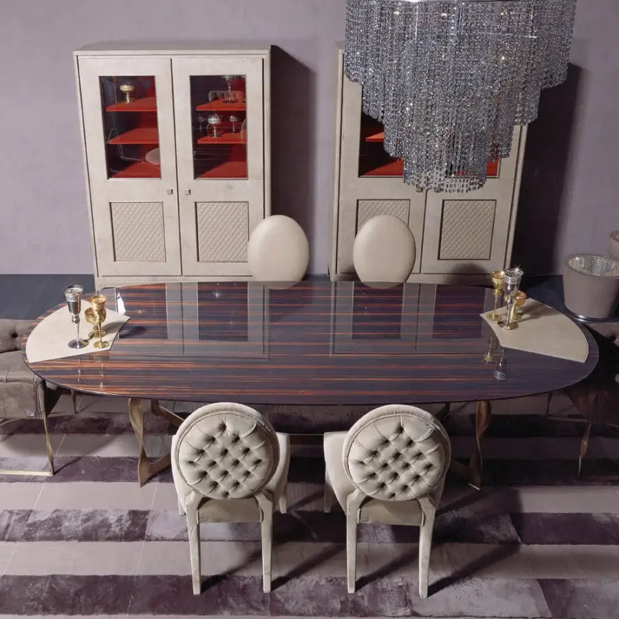 Lavish Rugiano Pliet table crafted with horizontally striped ebony wood and radiant brass-colored metal base