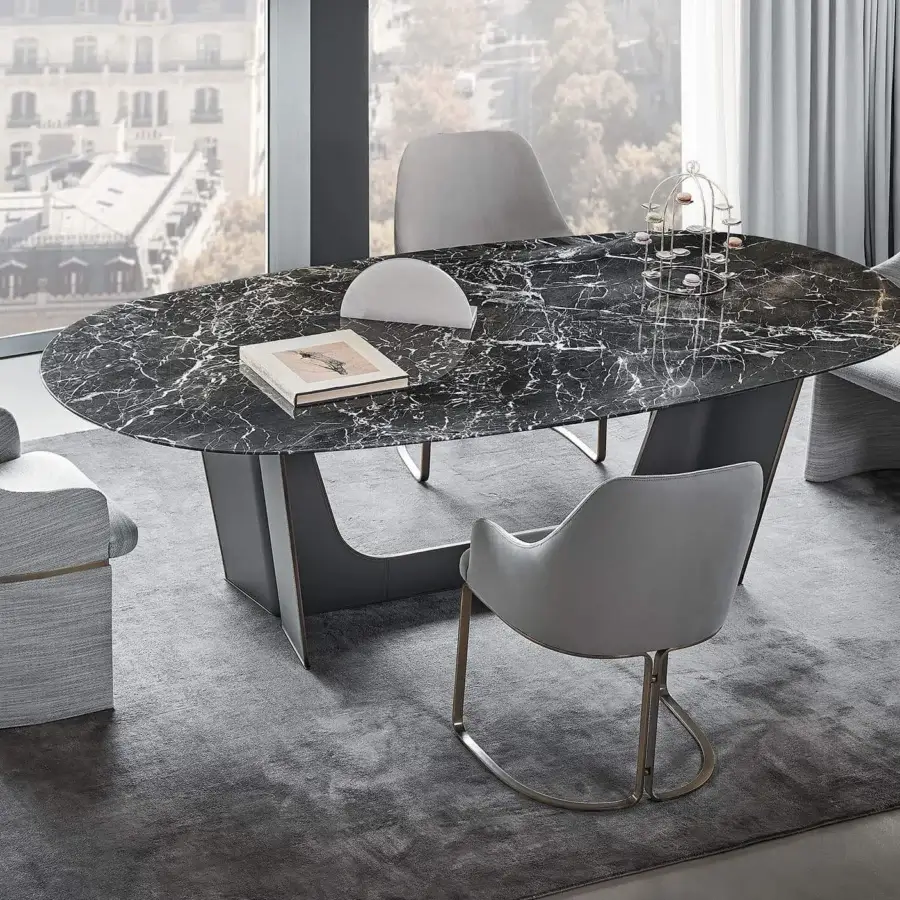 Superior Rugiano Wings table crafted in Italy with dark marble-like top and bronzed brass base adorned with grey embroidered leather