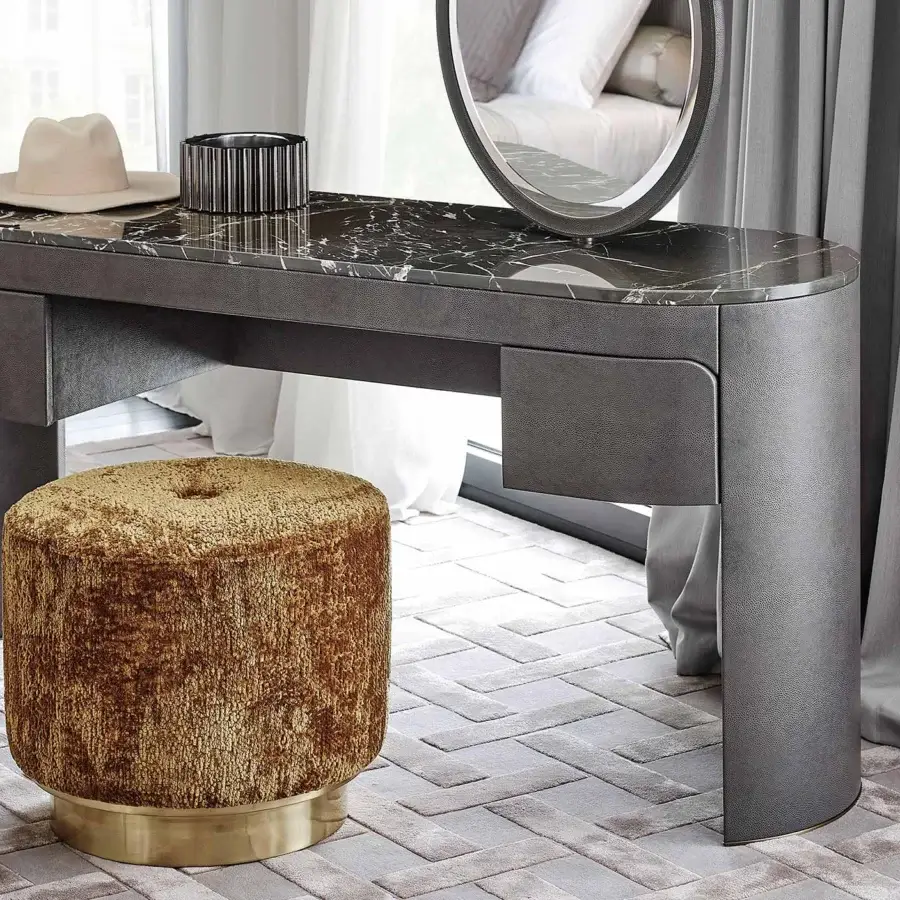Distinguished Rugiano Vogue vanity with black marble top and textured gray base including golden velvet stool and dark-framed mirror