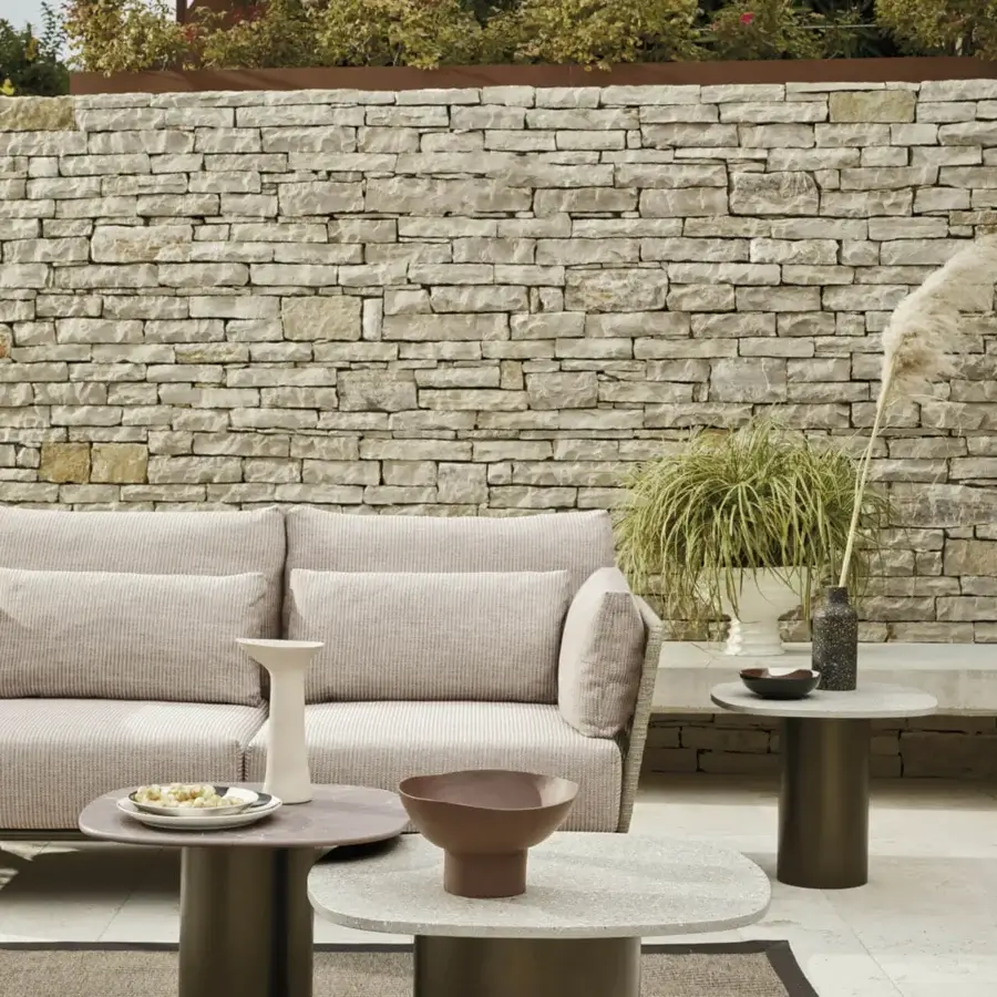 Exceptional Roberti Rattan Armàn coffee table with speckled terrazzo top and powder-coated Aisi 304 stainless steel base