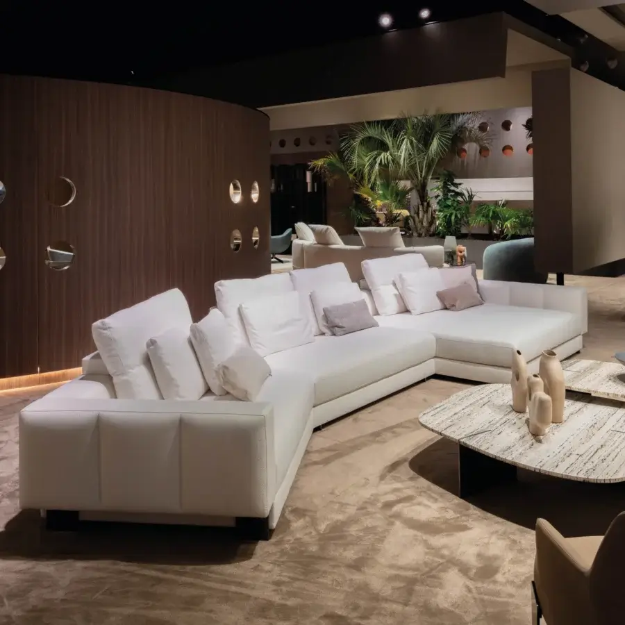 Superior Arketipo Milky Way sofa with quilted vertical lines and gently rounded white cushions crafted in a uniform textile material