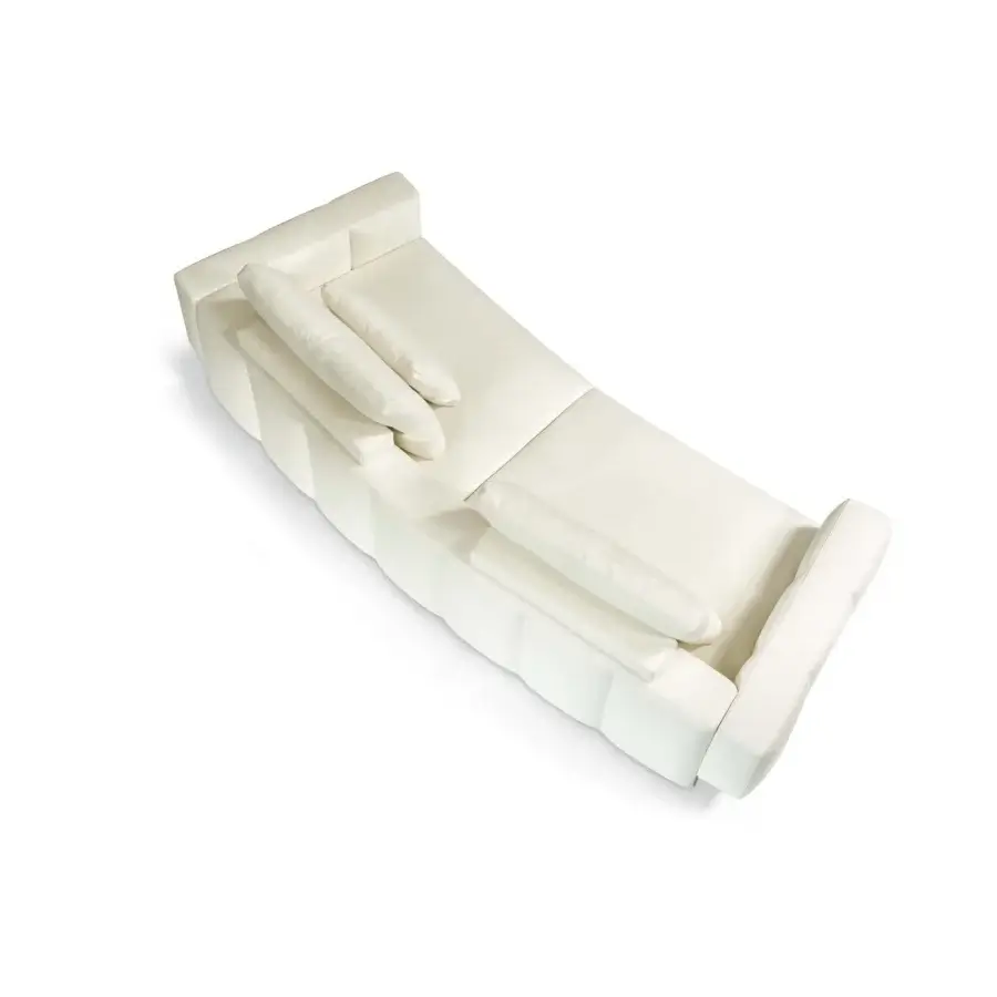 Superior Arketipo Milky Way sofa upholstered in smooth matte off-white textile with quilted vertical lines and a low profile base