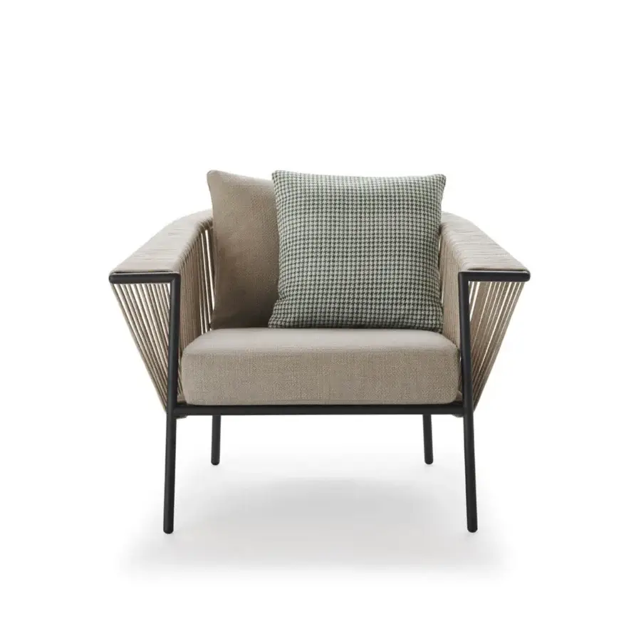 Captivating Roberti Rattan Corolle lounge chair woven in light brown Oval Trendyrope with a powder coated Aisi 304 stainless steel frame