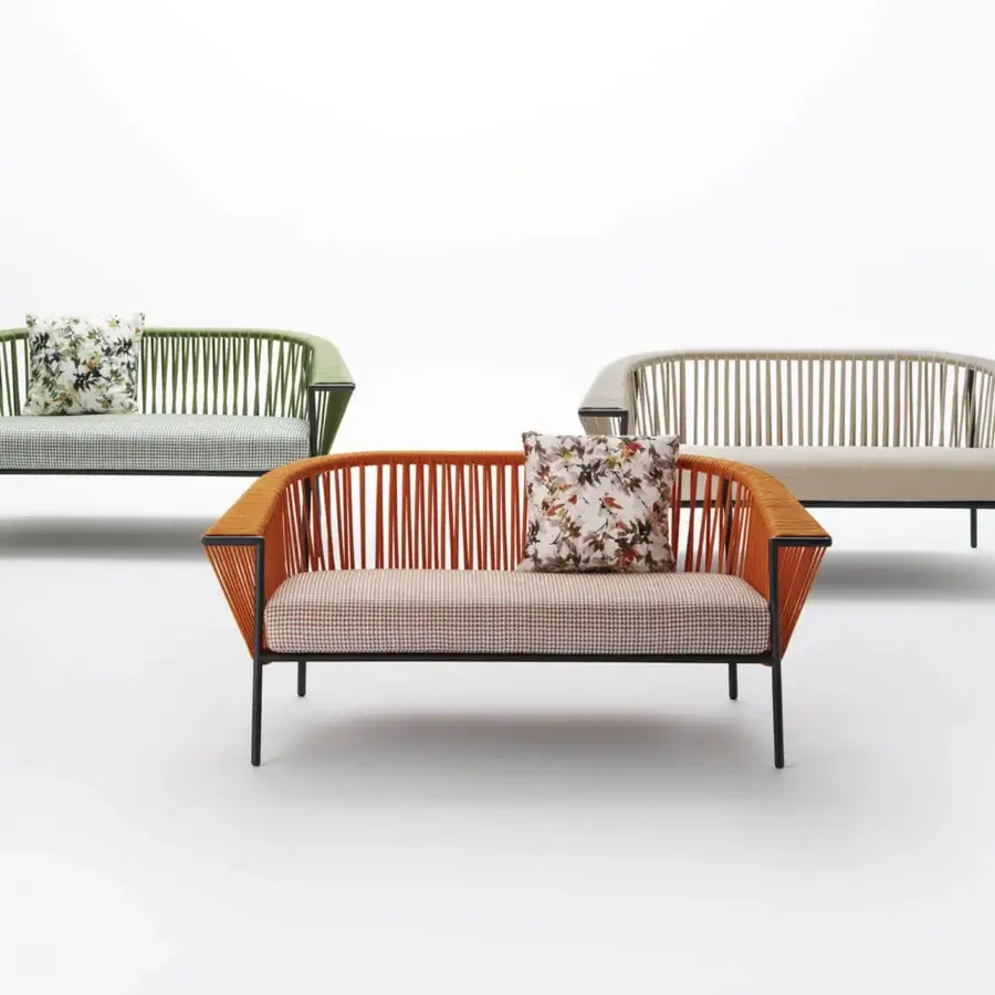 Exceptional Roberti Rattan Corolle sofa with vibrant orange woven Oval Trendyrope and powder-coated Aisi 304 stainless steel frame
