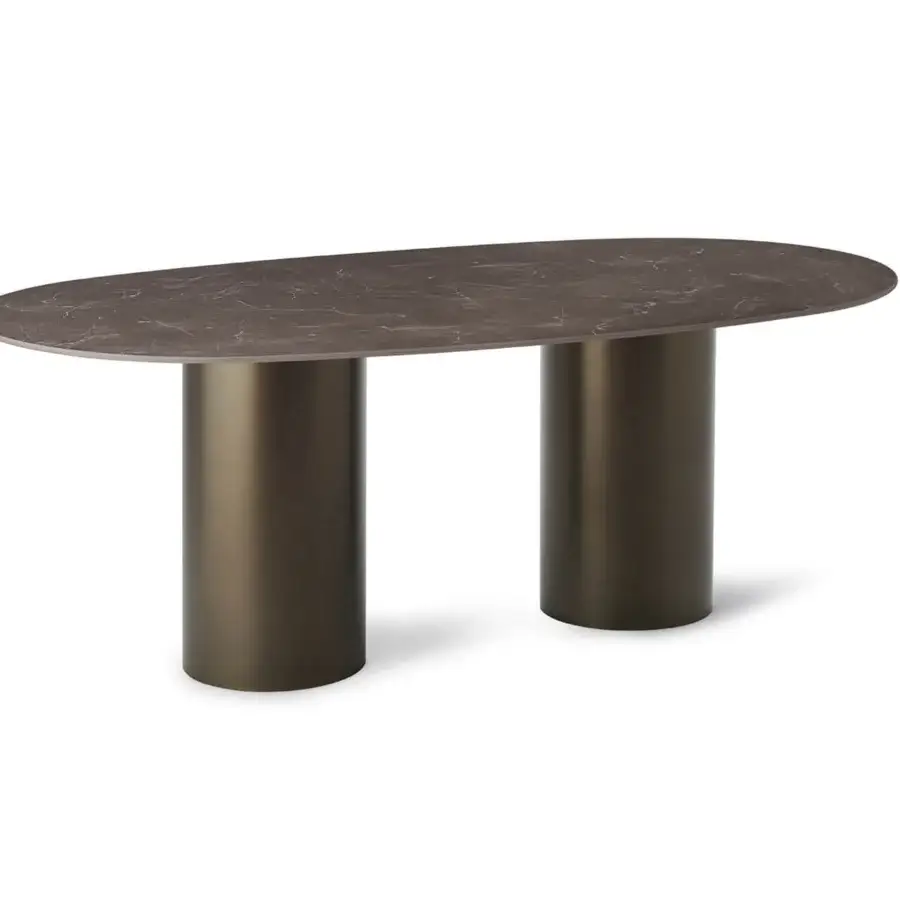 Distinguished Roberti Rattan table with oval marbled HPL top and bronze-like powder coated Aisi 304 stainless steel double base