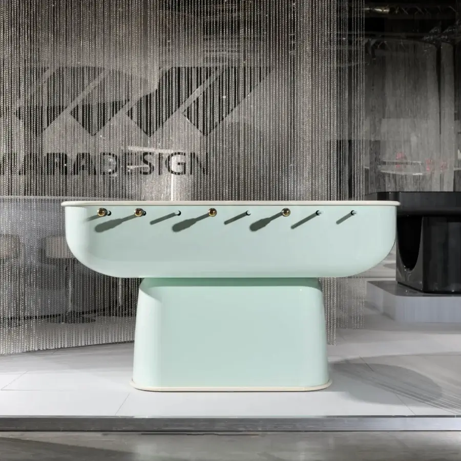 Distinguished Vismara Oskar foosball table with glossy pastel green lacquered structure and chromed steel rotating bars