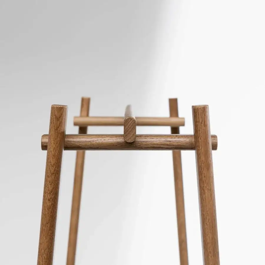 Superior Bonaldo Isola coat rack with light to medium brown wood and smooth finish crafted in Italy