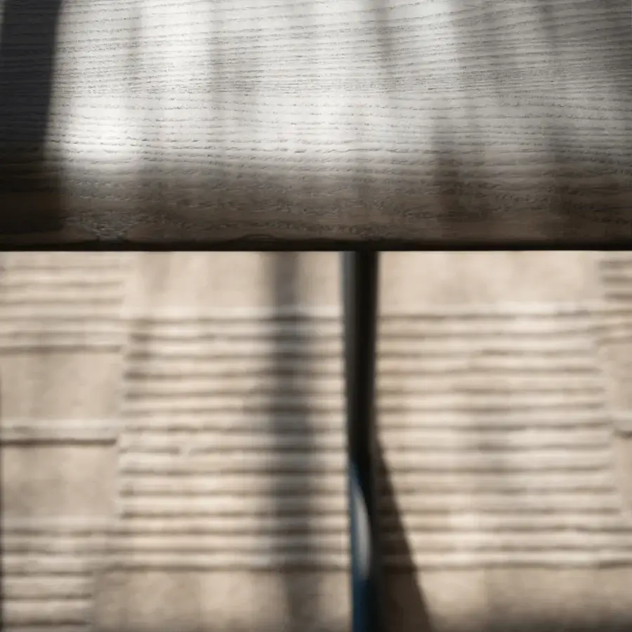 Superior Potocco Graphic dining table with a light brown wooden top and robust dark metal structure in a matte finish