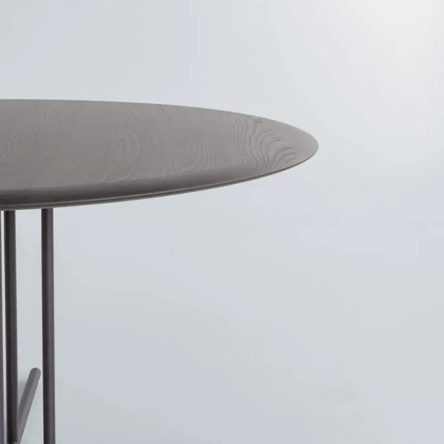 Elegant Potocco Graphic dining table with a round wooden tabletop and slender metal base in matte medium gray