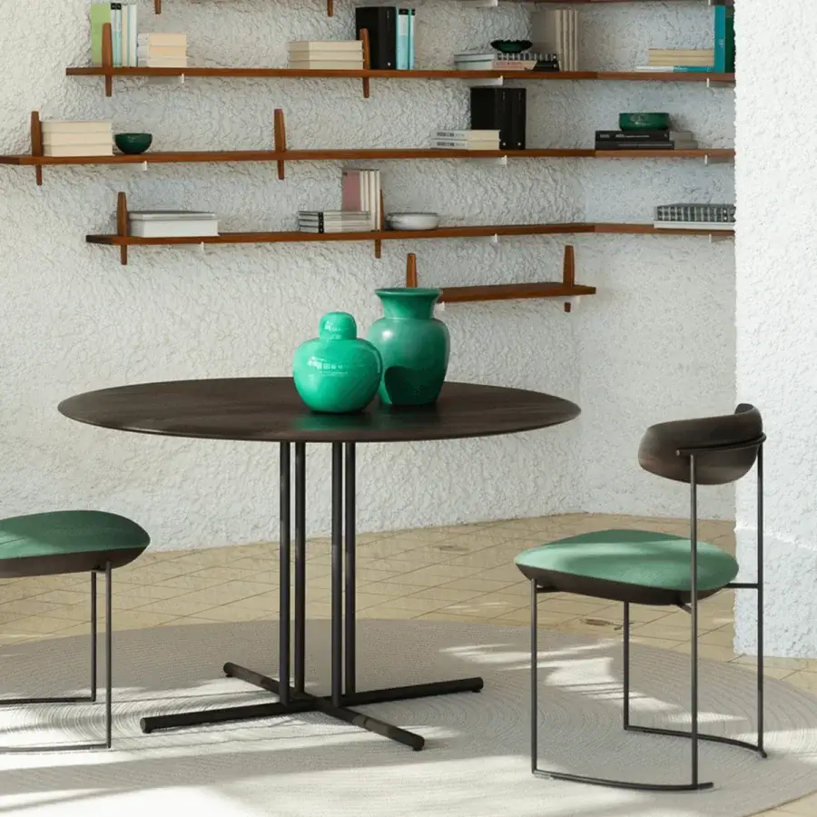 Distinguished Potocco Graphic dining table with a round dark-toned wooden tabletop and metal base in a matte finish