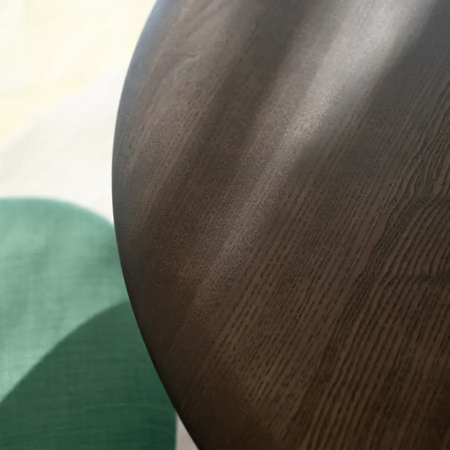 Exceptional Potocco Graphic dining table with a round dark brown wooden top and smooth reflective surface