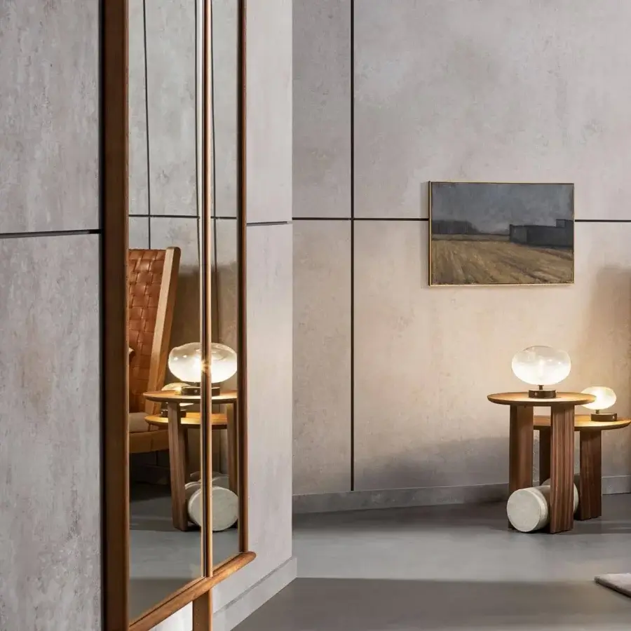 Distinguished Bonaldo Isola mirror with a moveable flag wing framed in medium-toned solid wood and vertical mirror panels