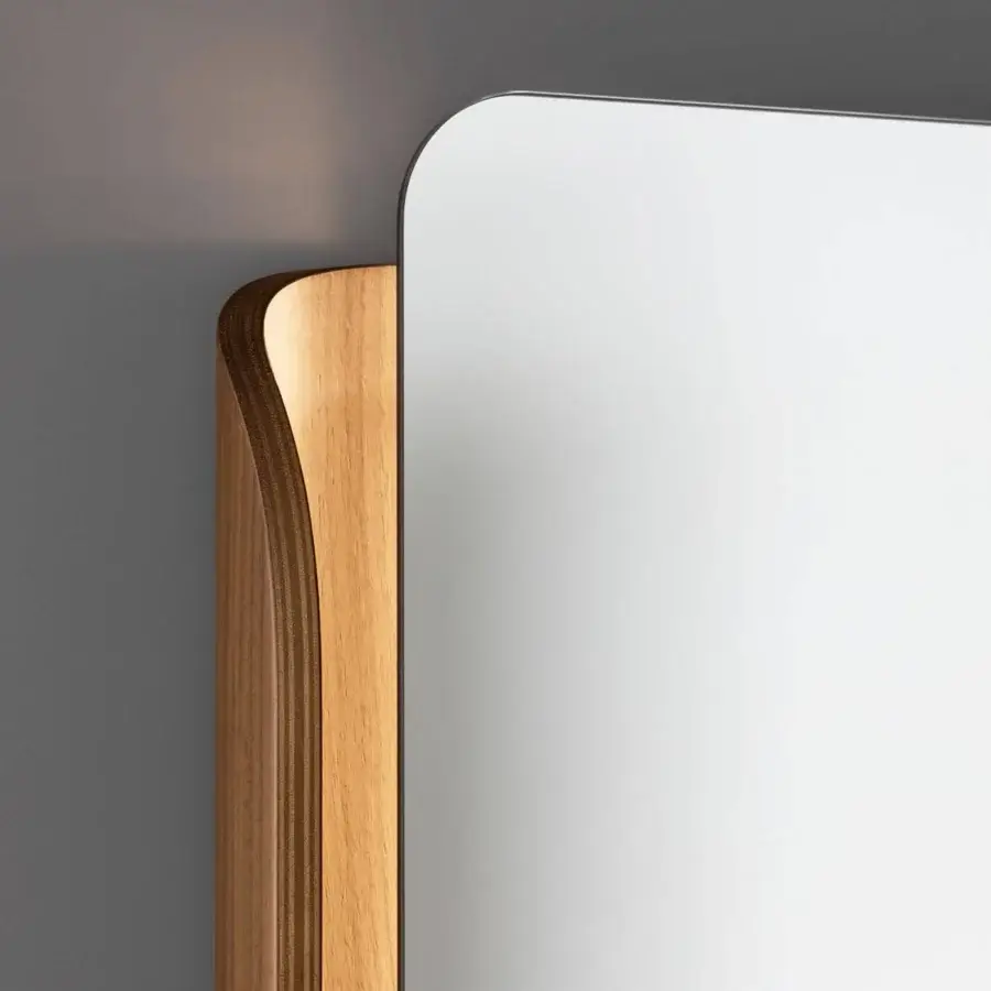 Elegant Bonaldo Olos mirror with a warm brown wood platform and inward curve presents a contemporary Italian design