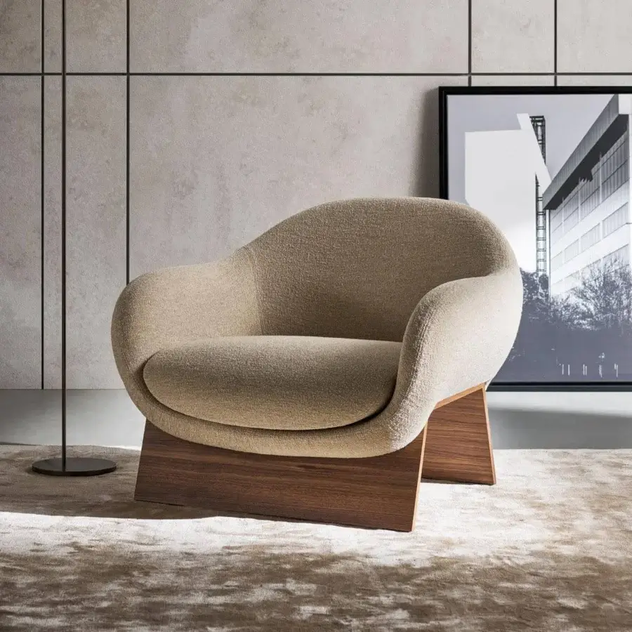 Elegant Bonaldo Boolean lounge chair upholstered in light beige textured fabric with veneered wood and metal base