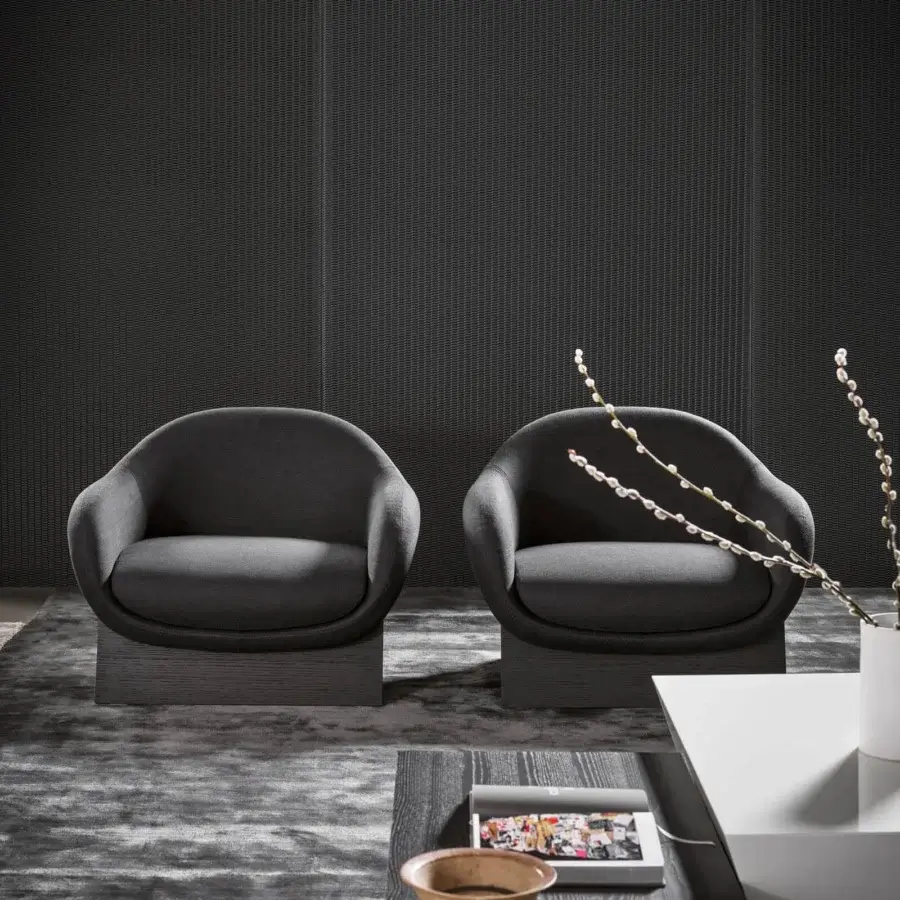 Distinguished Bonaldo Boolean lounge chair with soft curvilinear lines in gray textile and dark veneered wood base